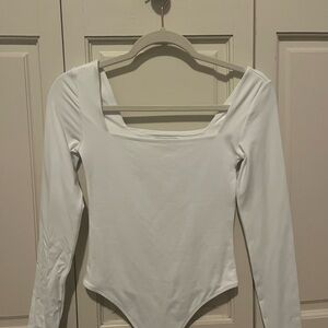 Aritzia White Long Sleeve Bodysuit